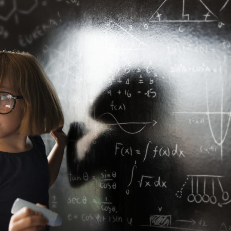 Little genius solving algebra in class